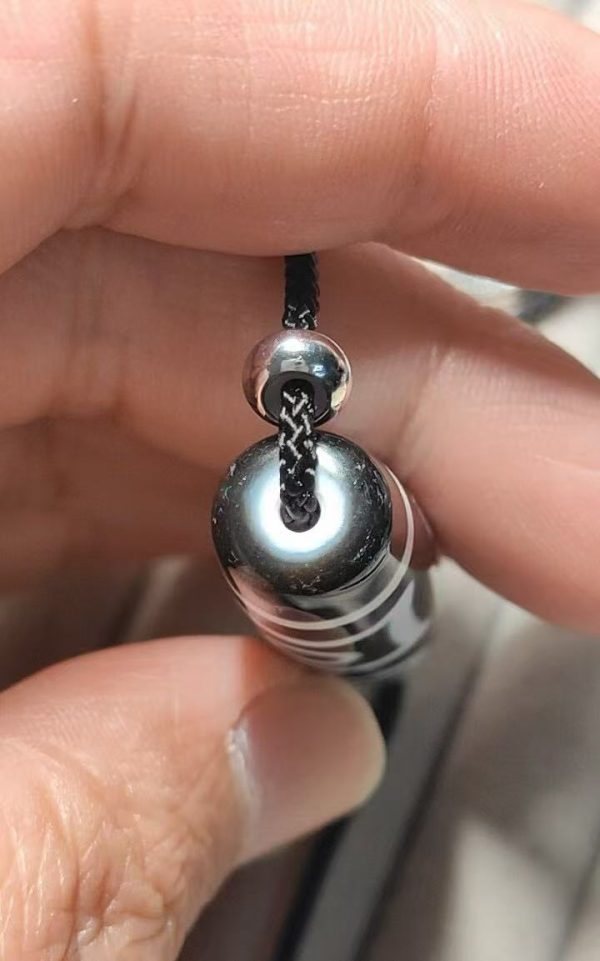 18b5abafcaa841518a065a1fe2e4da5d Black and white "eye within eye" Dzi bead, size 49*13mm