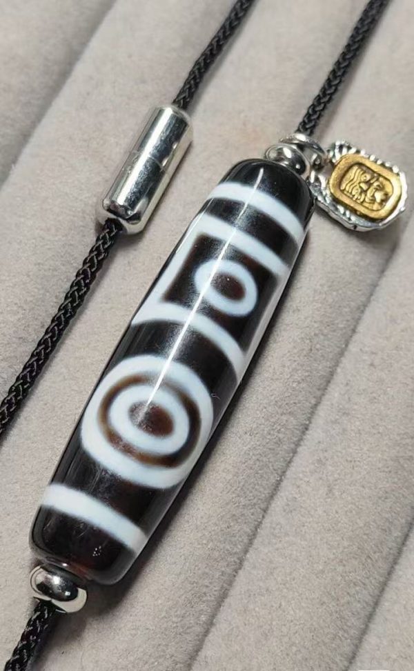 5977d893849eb74e9ade3603cd536803 Black and white "eye within eye" Dzi bead, size 49*13mm