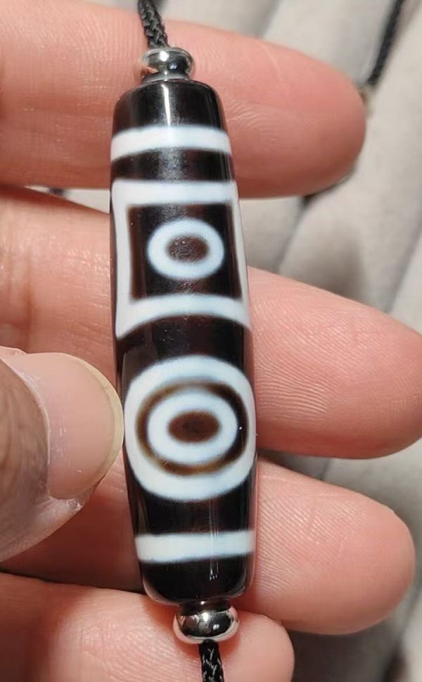 804a679a320aa906ee6db7102c0d6c4d Black and white "eye within eye" Dzi bead, size 49*13mm