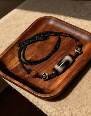 17 Curated Collection-Tiger Tooth Dzi